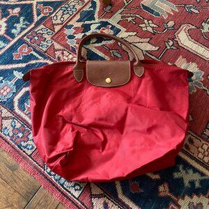 Longchamp red le pliage small handle tote bag